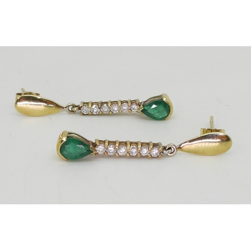 2729 - EMERALD & DIAMOND EARRINGSmounted in 18k gold, with two pear shaped emeralds of approx 7mm x 5mm... 