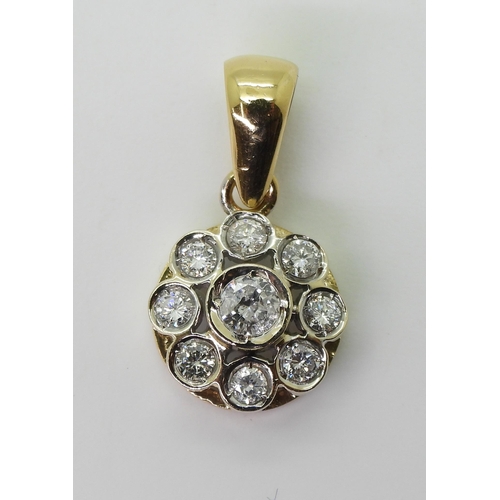 2731 - A DIAMOND FLOWER PENDANTmounted in 18ct gold and set with estimated approx 0.60cts of brilliant cut ... 