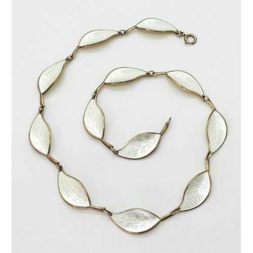2744 - A DAVID ANDERSEN NECKLACEthe classic white enamelled leaf necklace , is made in gilded sterling silv... 