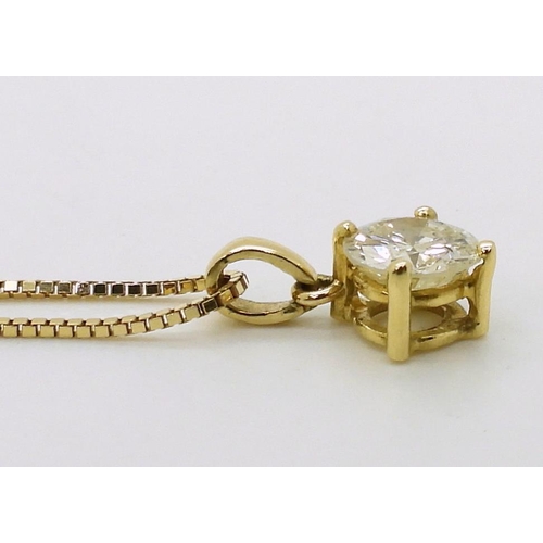 2752 - A DIAMOND SOLITAIRE PENDANT mounted in 18ct gold mount and on a 18ct gold box chain 45cm, the diamon... 