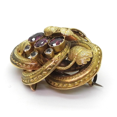 2759 - A GERMAN GEM SET BROOCH & EARRINGSset with foiled back garnets and clear gems, with a botanical ... 