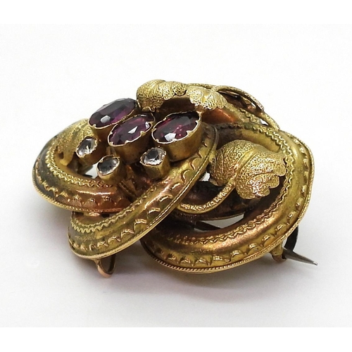 2759 - A GERMAN GEM SET BROOCH & EARRINGSset with foiled back garnets and clear gems, with a botanical ... 