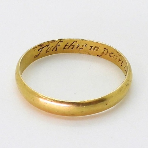 2767 - A POSY RINGin bright yellow metal, the inner shank engraved 'Tak this in part of a true heart' finge... 