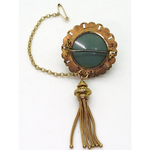 2770 - A VICTORIAN TURQUOISE BROOCHstamped 15ct, with domed locket back and tassel. diameter 3.3cm diameter... 