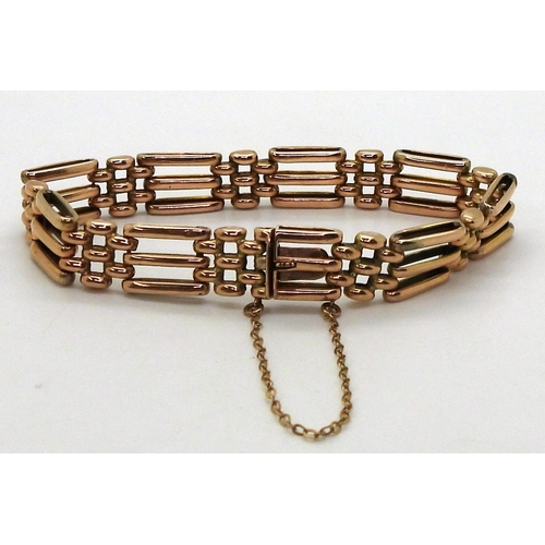 2771 - A ROSE GOLD GATE BRACELETmade in 9ct gold the fancy links have a box clasp stamped 9ct. Length 18cm,... 