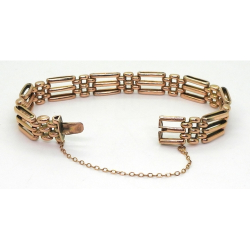 2771 - A ROSE GOLD GATE BRACELETmade in 9ct gold the fancy links have a box clasp stamped 9ct. Length 18cm,... 