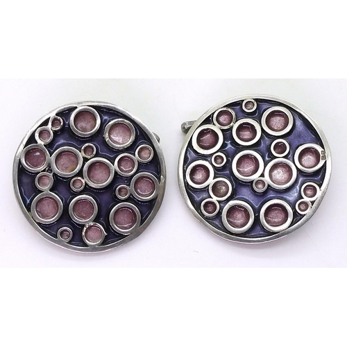 2775 - NORMAN GRANT CUFFLINKSfrom the 'Honesty collection' mounted in silver and enamelled in pink and purp... 