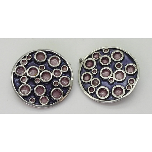 2775 - NORMAN GRANT CUFFLINKSfrom the 'Honesty collection' mounted in silver and enamelled in pink and purp... 