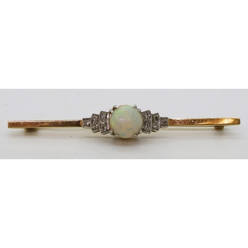 2780 - AN OPAL AND DIAMOND BROOCHset in 18ct yellow gold and platinum, set with a central round opal of app... 