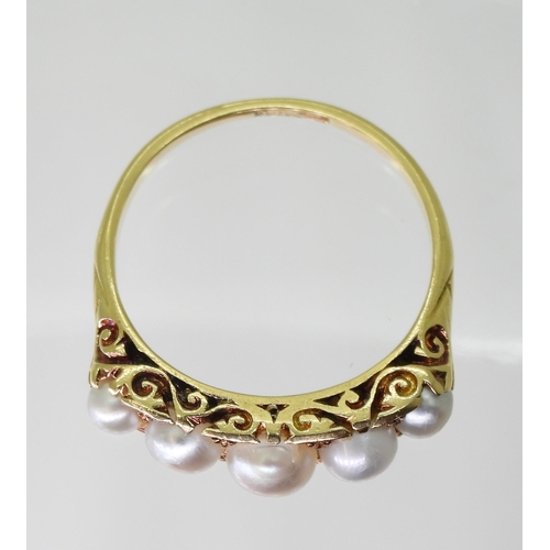 2788 - A FIVE PEARL RINGin classic 18ct gold scroll mount, finger size O1/2, weight 3.9gms... 