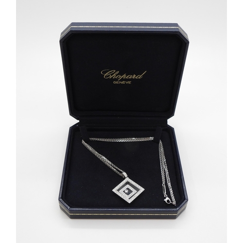 2795 - A CHOPARD HAPPY-SPIRIT PENDANTin 18ct white gold, the square pendant has two diamond set free floati... 