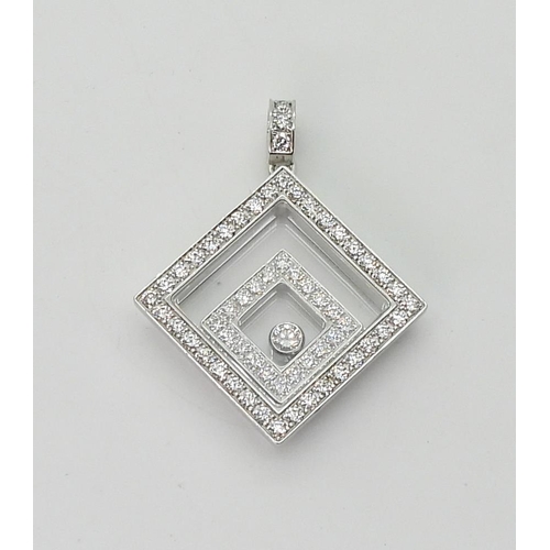 2795 - A CHOPARD HAPPY-SPIRIT PENDANTin 18ct white gold, the square pendant has two diamond set free floati... 