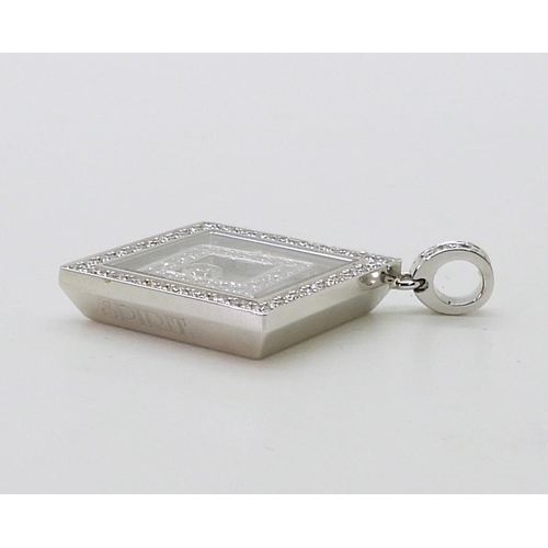 2795 - A CHOPARD HAPPY-SPIRIT PENDANTin 18ct white gold, the square pendant has two diamond set free floati... 