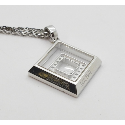 2795 - A CHOPARD HAPPY-SPIRIT PENDANTin 18ct white gold, the square pendant has two diamond set free floati... 