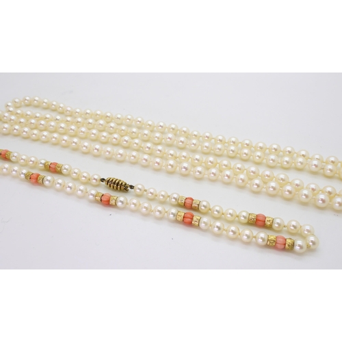 2796 - TWO STRINGS OF PEARLSa string of Mikimoto pearls with coral and 9ct gold bead details, the tongue of... 