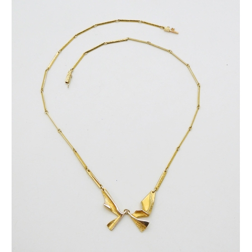 2800 - AN 14CT LAPPONIA NECKLACEan abstract winged form with baton links and box clasp, signed Lapponia wit... 