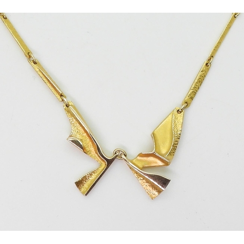 2800 - AN 14CT LAPPONIA NECKLACEan abstract winged form with baton links and box clasp, signed Lapponia wit... 