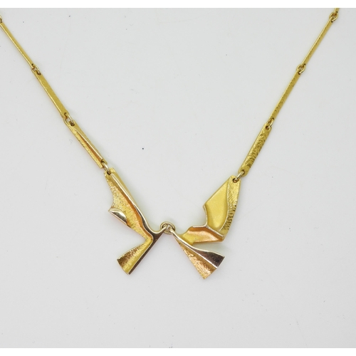 2800 - AN 14CT LAPPONIA NECKLACEan abstract winged form with baton links and box clasp, signed Lapponia wit... 