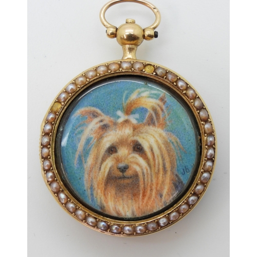 2803 - A YORKSHIRE TERRIER PORTRAIT MINIATUREpainted on ivory and mounted inside a yellow metal fob watch c... 