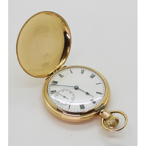 2902 - A 9CT GOLD WALTHAM POCKET WATCHclassic white enamel dial with black Roman numerals and blued steel h... 