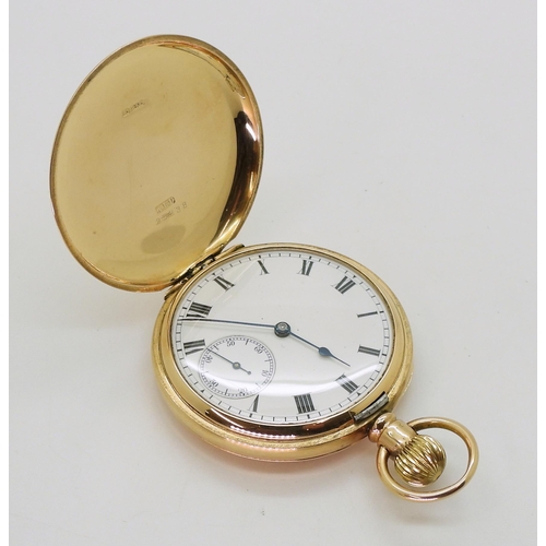 2902 - A 9CT GOLD WALTHAM POCKET WATCHclassic white enamel dial with black Roman numerals and blued steel h... 