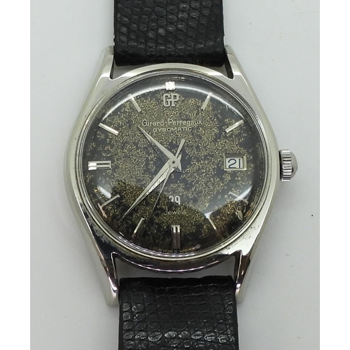 2903 - A VINTAGE GIRARD PERREGAUXthe stainless steel gents Gyromatic watch, has a patinaed dial, silver col... 