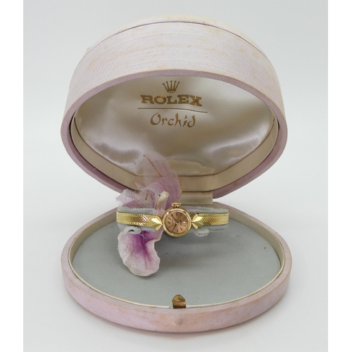 2906 - AN 18CT GOLD LADIES ROLEX ORCHIDthe gold coloured dial with gold baton numerals and hands, is signed... 