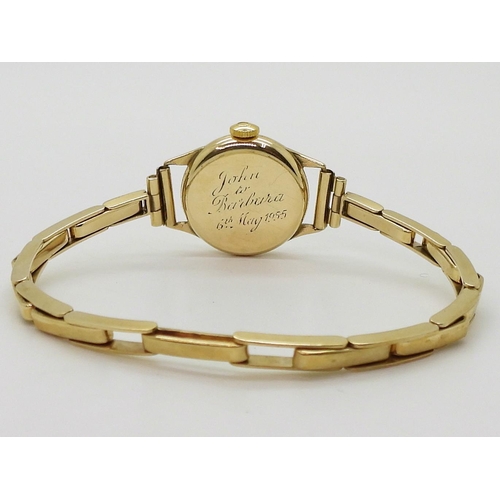 2914 - A LADIES OMEGA WRISTWATCHboth the case and the strap are in 9ct gold, inscribed and dated 1955, Birm... 