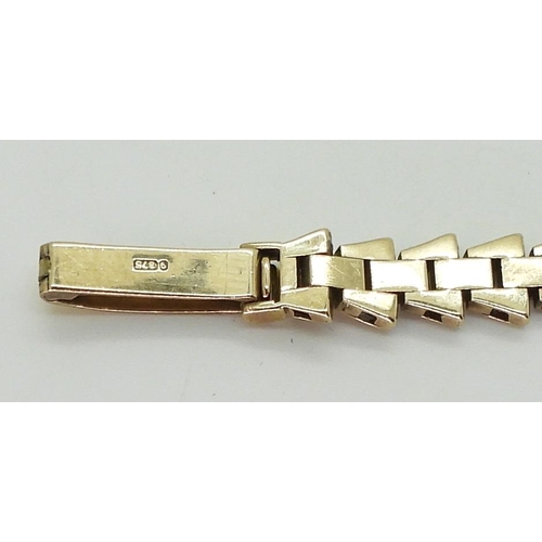 2917 - A LADIES JAEGER LECOULTRE WATCHin 9ct gold with a fancy link strap, the cream dial with Arabic and b... 