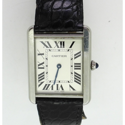 2927 - A CARTIER TANK WRISTWATCHwith silvered dial, black roman numeral and blued steel hands, reference nu... 