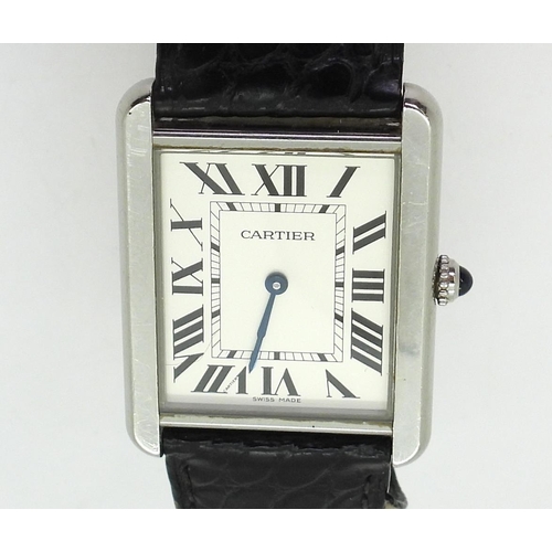 2927 - A CARTIER TANK WRISTWATCHwith silvered dial, black roman numeral and blued steel hands, reference nu... 