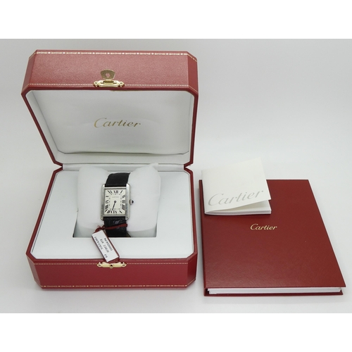 2927 - A CARTIER TANK WRISTWATCHwith silvered dial, black roman numeral and blued steel hands, reference nu... 