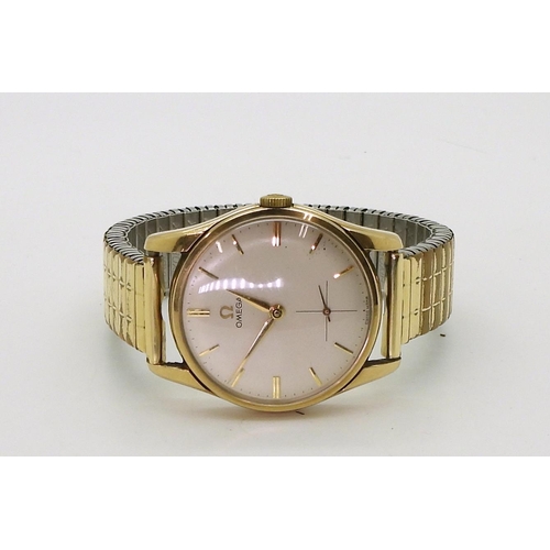 2932 - A GENTS OMEGA & A FOB WATCHThe 9ct gold gents Omega wristwatch has a cream dial with a cross hai... 