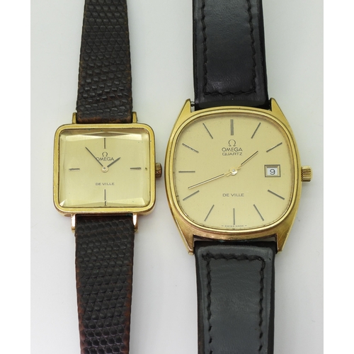 2934 - TWO GOLD PLATED OMEGA DE VILLESthe gents Omega Quartz De Ville watch has a rounded square case, gold... 