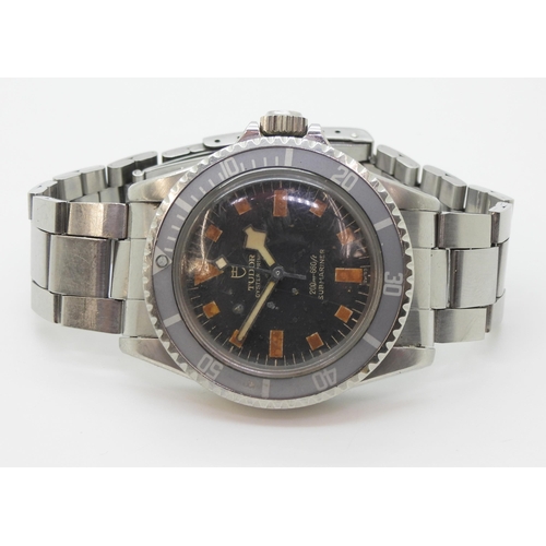 2936 - A TUDOR OYSTER SNOWFLAKE PRINCE SUBMARINERin stainless steel, with a black dial, baton and chevron n... 