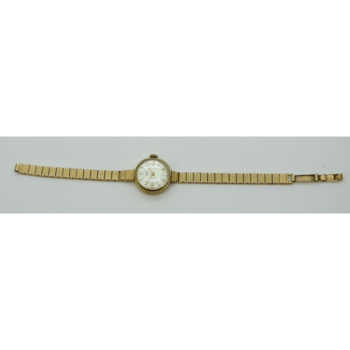 2937 - A 9CT GOLD TUDOR ROYALwith a cream dial with gold coloured baton numerals and hands. Hallmarked Birm... 