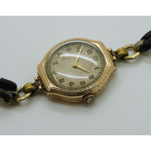 2938 - A 9CT LADIES ROLEXwith cream dial with gold coloured arabic numerals and hands, made in 9ct rose gol... 