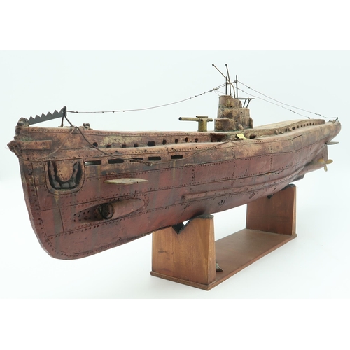 3010 - TOM MCKENDRICK RSW RGI (SCOTTISH B.1948)U-BOAT IICeramic and copper, 87cm long (34.25