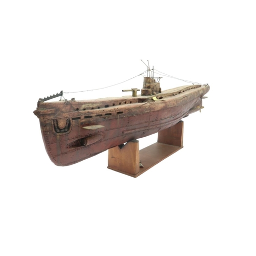 3010 - TOM MCKENDRICK RSW RGI (SCOTTISH B.1948)U-BOAT IICeramic and copper, 87cm long (34.25