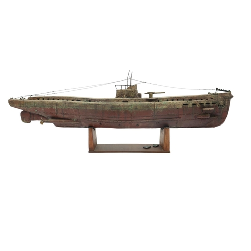 3010 - TOM MCKENDRICK RSW RGI (SCOTTISH B.1948)U-BOAT IICeramic and copper, 87cm long (34.25