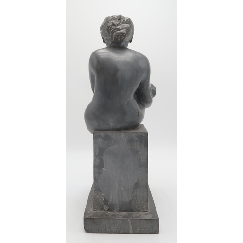 3060 - EUROPEAN SCHOOL (20thC)SEATED FEMALE NUDE WITH BABYCarved soapstone, 51cm (20