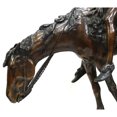 2238A - JAMES EARLE FRASER (1876-1953)End of the TrailA large bronze of a native Indian on horseback, limite... 