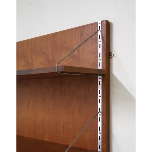 2105A - A MID 20TH CENTURY JOHN AND SYLVIA REID FOR STAG S RANGE SHELVING UNIT with rectangular teak wall mo... 