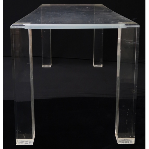 2115B - A 20TH CENTURY LUCITE CHARLES HOLLIS JONES STYLE DINING SUITE comprising rectangular chamfered toppe... 