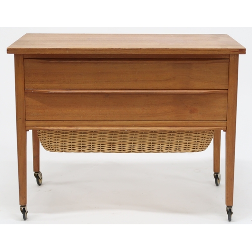 2108A - A MID 20TH CENTURY TEAK SCANDINAVIAN STYLE SEWING TABLE with two long drawers over slide out ra... 