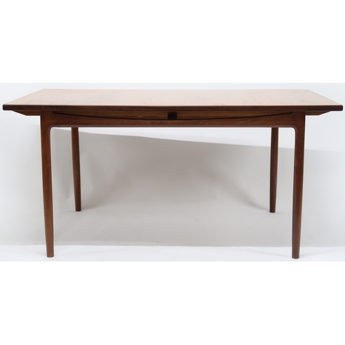 2102A - A MID 20TH CENTURY TEAK KOFOD LARSEN FOR G PLAN DINING SUITE comprising rectangular top table w... 