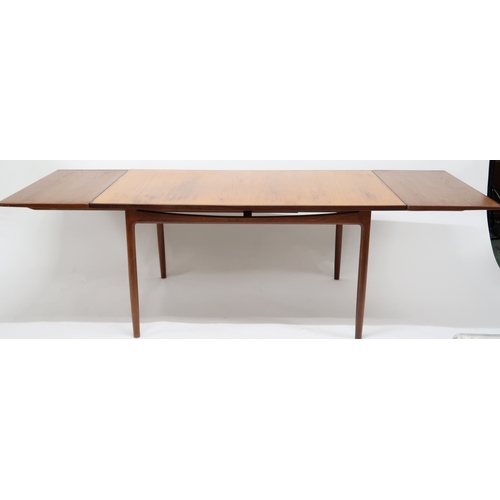 2102A - A MID 20TH CENTURY TEAK KOFOD LARSEN FOR G PLAN DINING SUITE comprising rectangular top table w... 