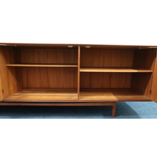 2102B - A MID 20TH CENTURY TEAK KOFOD LARSEN FOR G PLAN SIDEBOARD with bank of five graduating drawers along... 