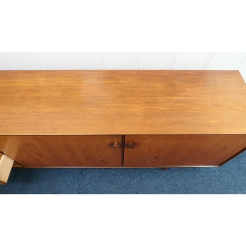 2102B - A MID 20TH CENTURY TEAK KOFOD LARSEN FOR G PLAN SIDEBOARD with bank of five graduating drawers along... 