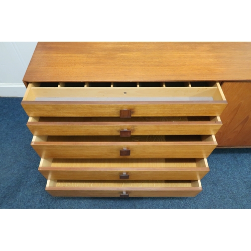 2102B - A MID 20TH CENTURY TEAK KOFOD LARSEN FOR G PLAN SIDEBOARD with bank of five graduating drawers along... 